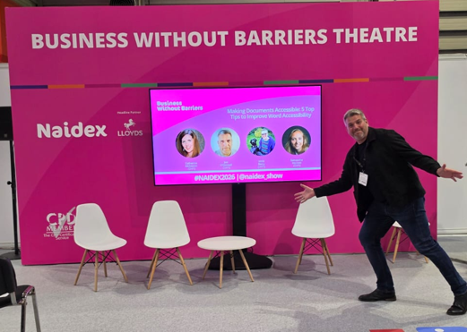 Jon at Naidex 2026 presenting with Daps